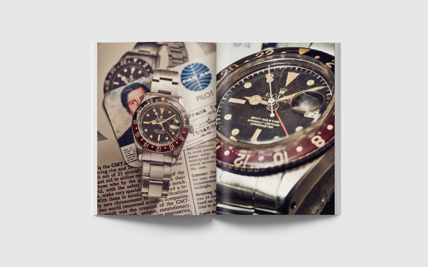 Double page du magazine ouverte sur la Rolex GMT-Master 6542, lunette bakélite en gros plan